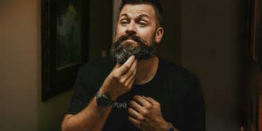 Masculine man grooming beard, self care. 