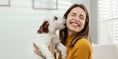 Dog showing love to their owner