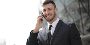 Man in suit on phone