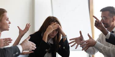 group of workers arguing with each other