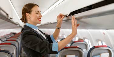 Flight attendant on airplane