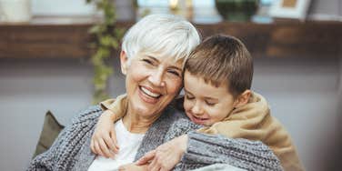 Grandma getting hug from grandson