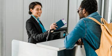 Happy gate agent at airport