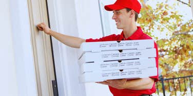 man delivering pizza 