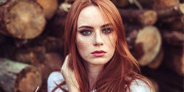 Red head woman looking serious 