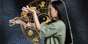 woman holding snake with chinese zodiac signs lucky year snake 2025