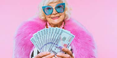 happy old lady with money