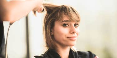 Woman getting a new hairstyle.