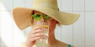 Woman drinking a healthy ingredient daily. 