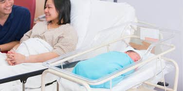 baby in plastic bed after being born in the hospital