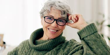 Smiling woman in glasses