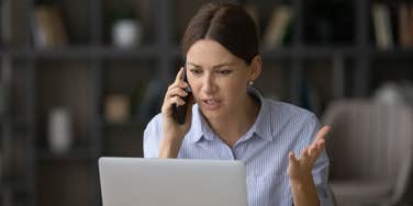 Woman on the phone with recruiter feeling confused