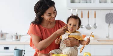 stay-at-home mom feeding baby