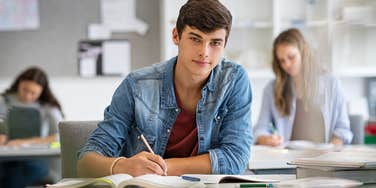 Teenage boy in class