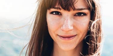 woman smiling into camera 