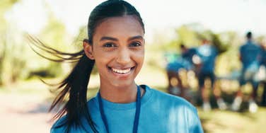 Young woman volunteer feeling calm and motivated during crisis