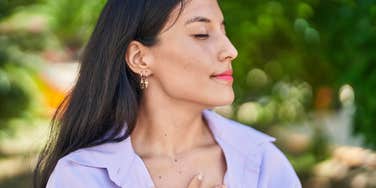 Woman doing breath of beingness technique