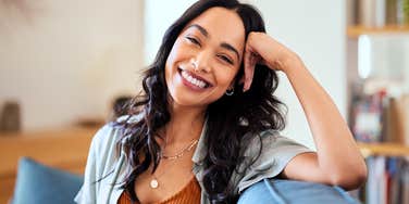 Woman smiles at camera, the most popular person in the room