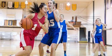 high school girls playing basketball