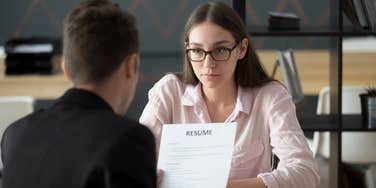 Job candidate about to walk out of an interview after being asked a ridiculous question