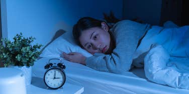 Woman who grew up in a chaotic household staying up late