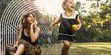 Free range child running as mother watches