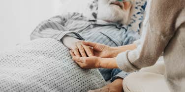 Old man in hospital bed