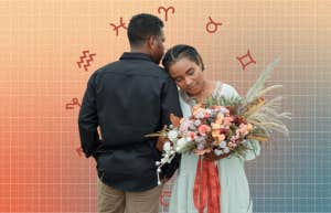 woman holding flowers with man, zodiac signs