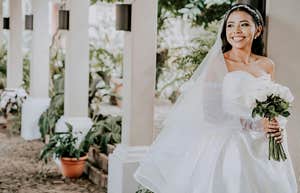 bride in wedding dress smiling