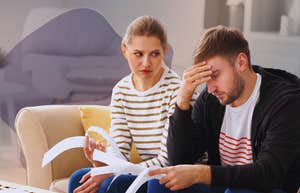 Woman talking to spouse about money problems.