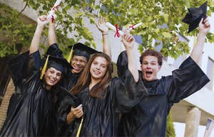 group of high school students celebrating at graduation