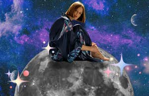 woman sitting on the moon being tested by universe in july 2024