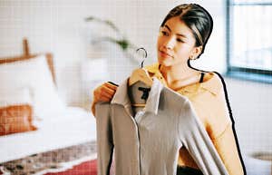 Woman changing her wardrobe to get further in life 