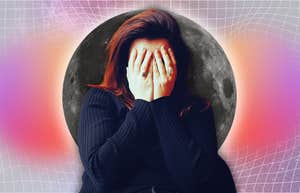woman with headache in front of full moon