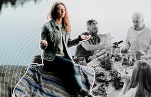 Woman sitting on a grey rock 