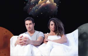 couple in bed in outerspace